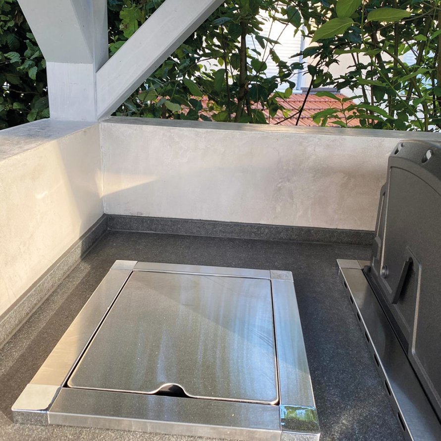 Außengrillfläche auf einer Arbeitsplatte | Hütte mit Mikrozement beschichtet